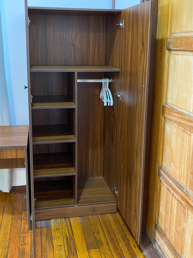 Bedroom wardrobe and TV area Pavalintang Resort