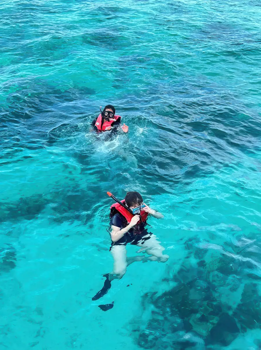 Guided snorkeling activities in the coral reefs Pavalintang Resort
