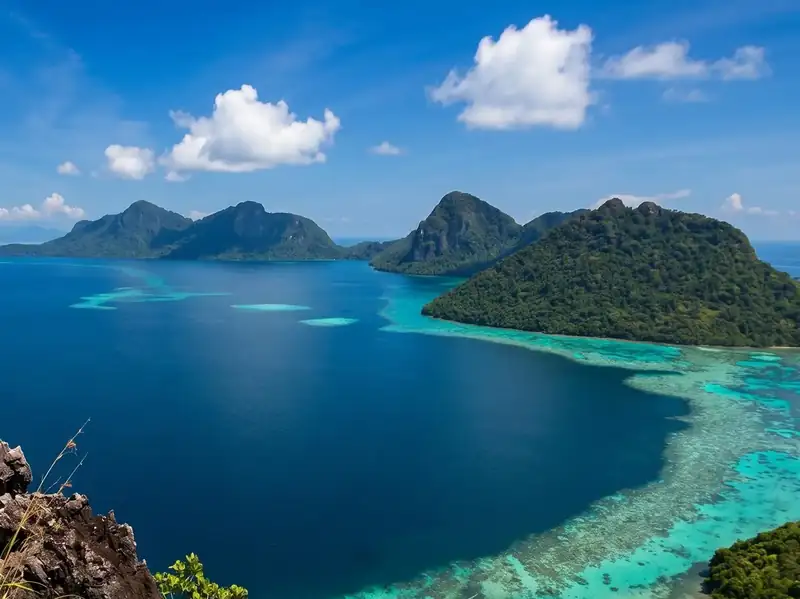 Island hopping around the Tun Sakaran Marine Park with Pavalintang Resort near the Tun Sakaran Marine Park